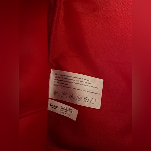 Hello Kitty 12” tall suitcase with wheels. - Picture 10 of 12